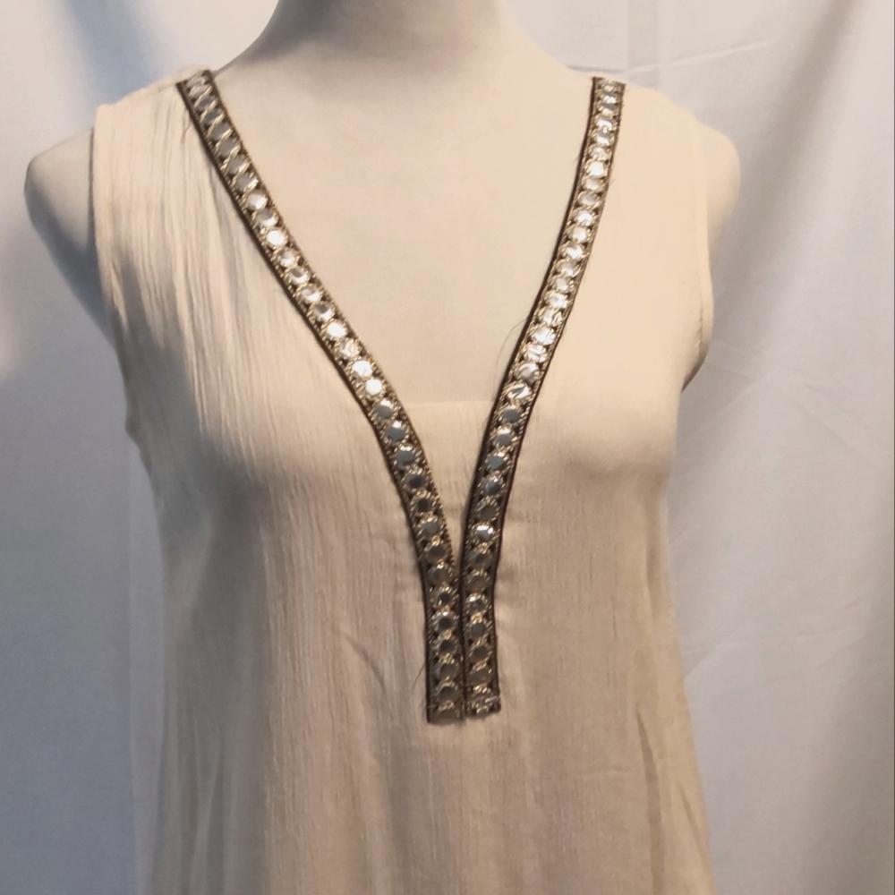 Elegant Cream Sleeveless Top with Gold Accents